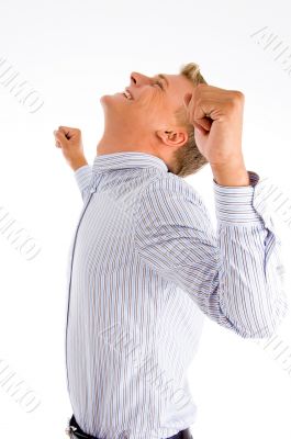 successful man looking upward