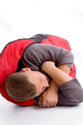 man taking rest in his sleeping bag