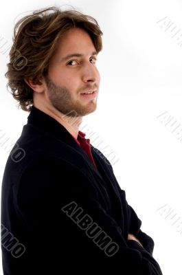 side pose of male looking at camera