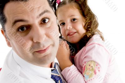 lovable father holding his happy daughter
