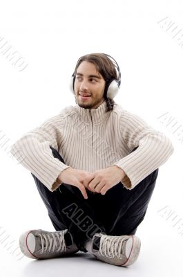 handsome male listening to music with headphones