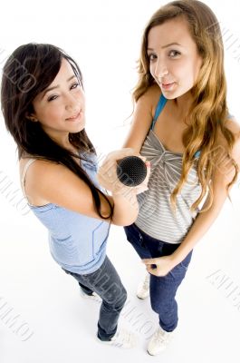 high angle view of girls holding microphone