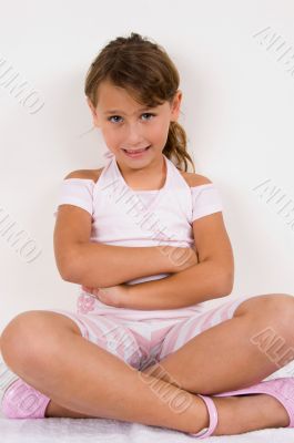 smiling girl with crossed arms