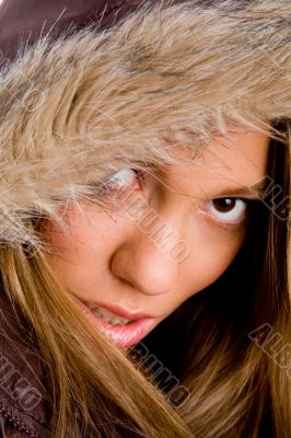 close up of young female wearing winter coat