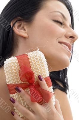 close up of woman scrubbing her neck