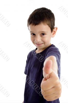 school boy showing thumbs up
