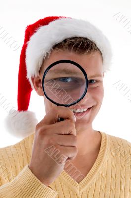 smiling male looking through lens