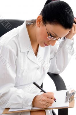 female doctor doing work on white background