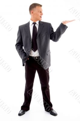 standing man looking at his palm