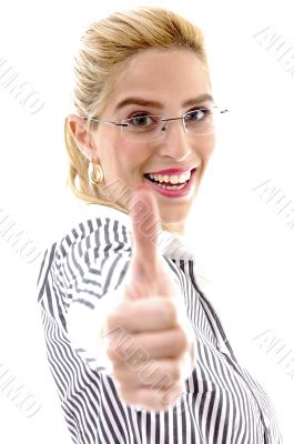 side view of businesswoman with thumbs up