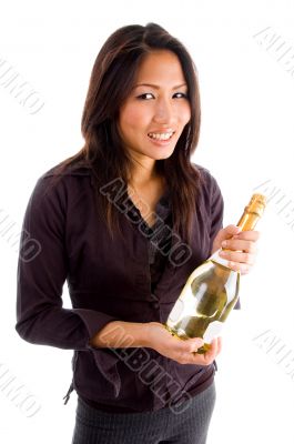 smiling asian woman holding champaign bottle