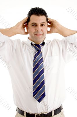 business executive with his hands on head