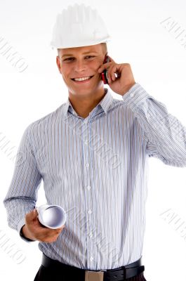 smiling architect busy on mobile