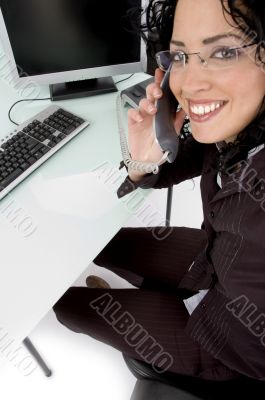 smiling woman talking on phone