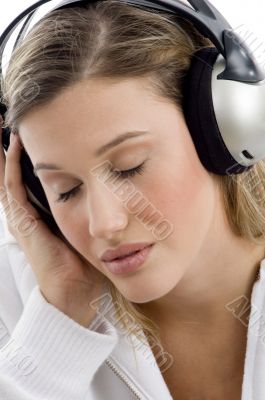woman listening to music with closed eyes
