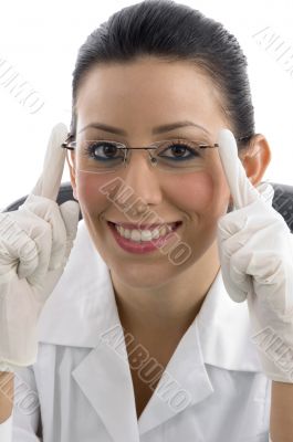 portrait of smiling doctor with hand gloves
