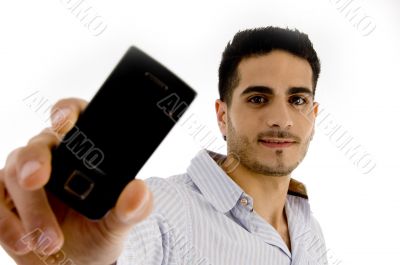 portrait of smiling man showing mobile