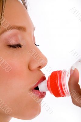 close up of woman drinking water