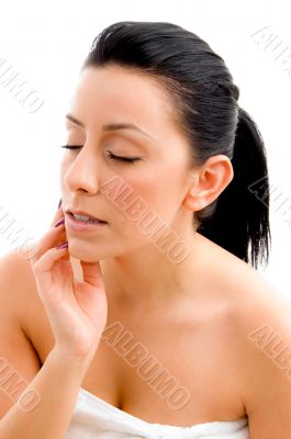 woman with closed eyes on an isolated background