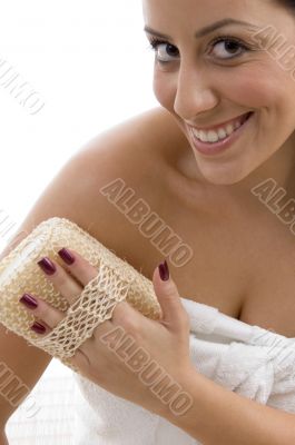 front view of woman scrubbing her body