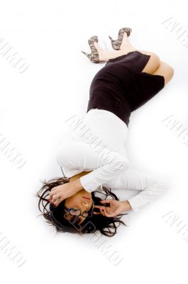 high angle view of female lying down on floor