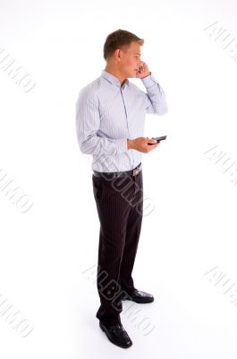 standing american man talking on cell phone