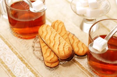 table set for high tea with sweet cookies