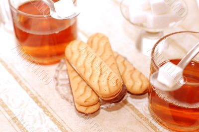 table set for high tea with sweet cookies