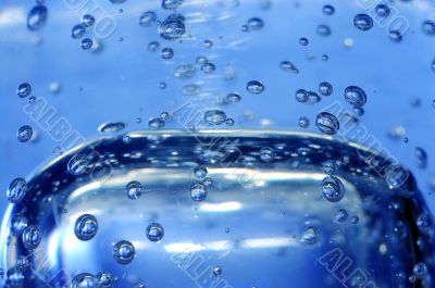 Blue water with bubbles