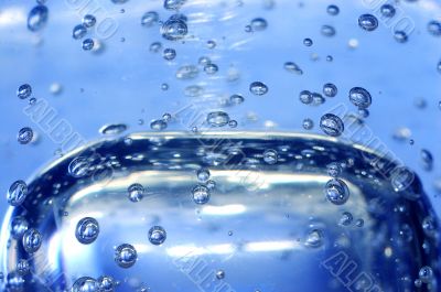 Blue water with bubbles