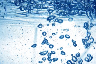 Blue water with bubbles