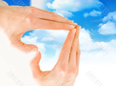 Hands and sky