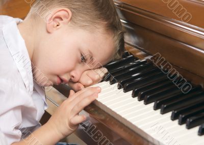 Young Boy Playing the Piano