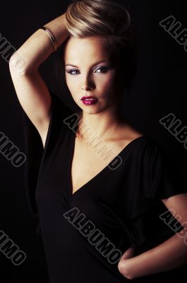 sexy blond girl on black background