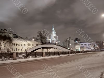 Moscow night view with bridge and `stalin` scyscraper