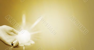 Background with lit lightbulb