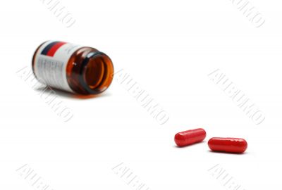 bottle with two pills