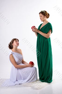 Two ladies and two apples
