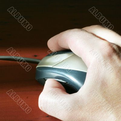 hand person and mouse