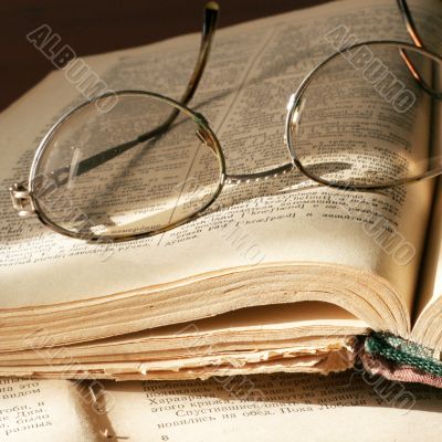 book and spectacles