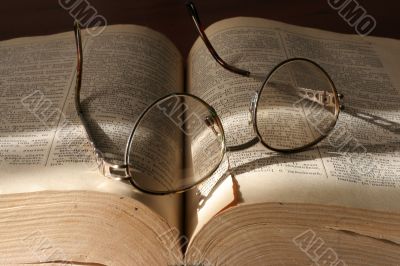 book and spectacles