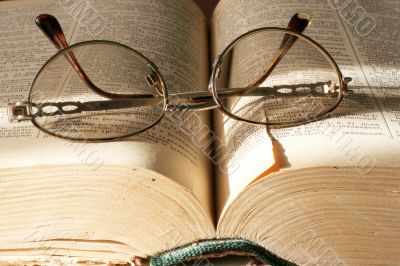book and spectacles