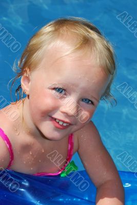 Girl in the sweming pool.