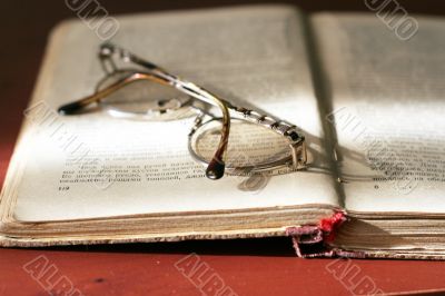 book and spectacles