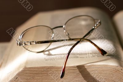 book and spectacles