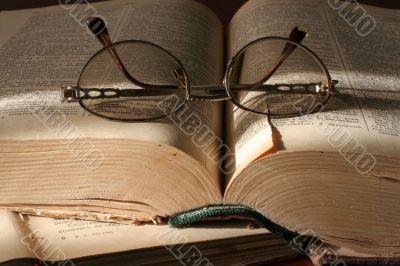 book and spectacles