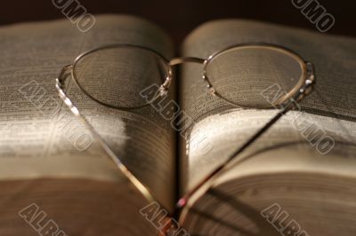 book and spectacles
