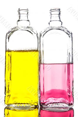 Colored Bottle with liquid on white