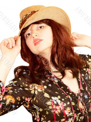 Young sensual woman in a hat
