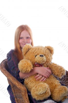 Redhead girl with her bear